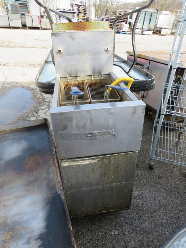 One Dean Natural Gas Deep Fryer With 2 Baskets On Casters. 15.5X30X46