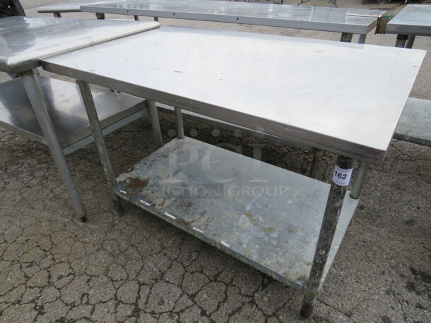 One Stainless Steel Table With Under Shelf. 48X30X34