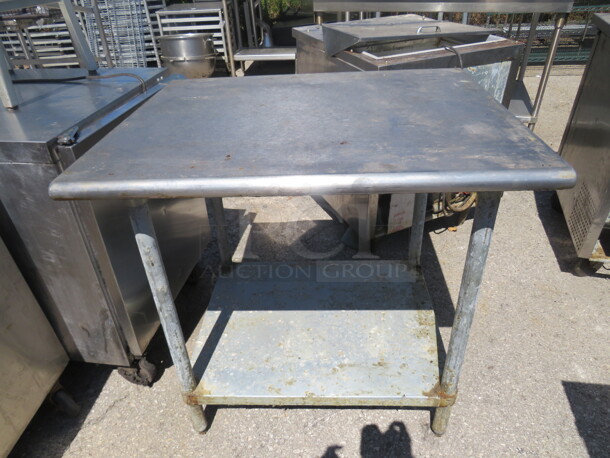 One Stainless Steel Table With Under Shelf.  36X30X36