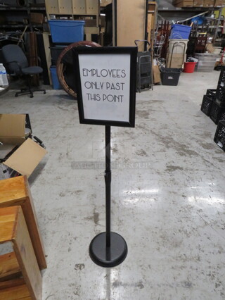 One Metal Floor Sign.