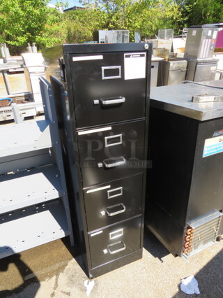 One 4 Drawer Black Metal File Cabinet. 15X26.5X52