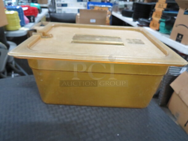 One 1/2 Size 6 Inch Deep Amber Food Storage Container With Lid.
