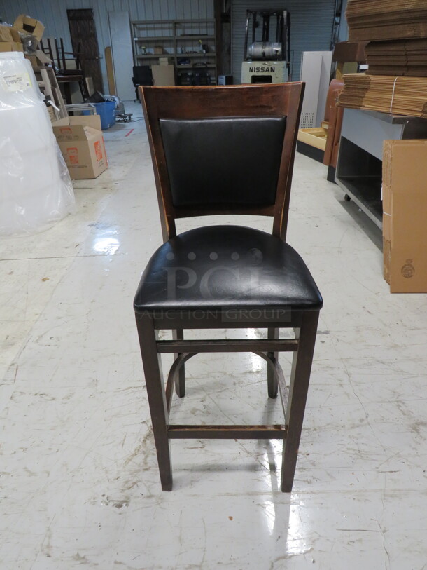 Wooden Bar Height Chair With A Black Cushioned Seat And Back. 2XBID