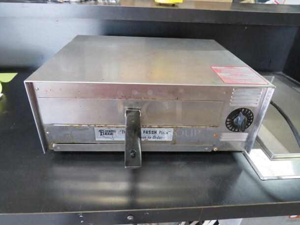 One Wisco Pizza Oven. Model# 412-4. 120 Volt. 1720 Watt. 18X15X7.5