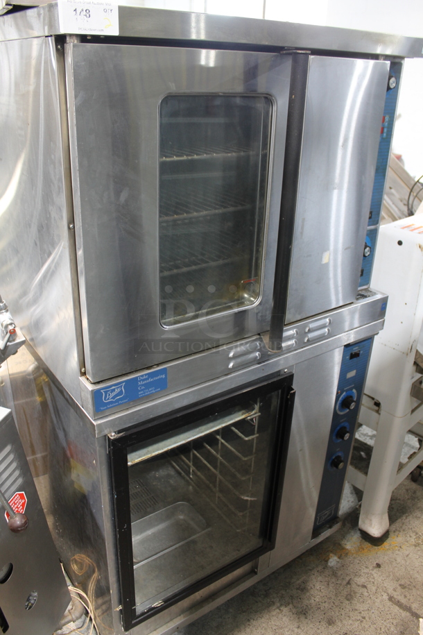 Duke Stainless Steel Commercial Gas Powered Full Size Convection Oven on Holding Proofing Cabinet. 