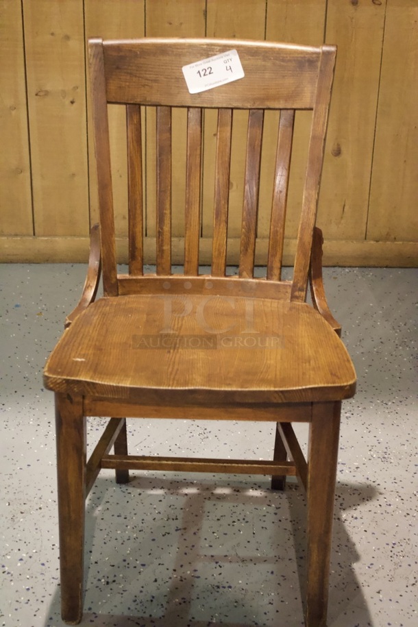 BEAUTIFUL! Set Of 4 Solid Wood Vertical Ladder Back Chairs. 18x13x35  
4x Your Bid.                      
some chairs are darker than others.