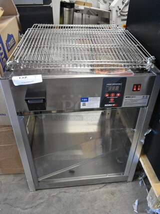 BRAND NEW SCRATCH AND DENT! ServIt 423PDW18D1S Stainless Steel Commercial Countertop Full-Service Countertop Display Warmer with 4 Shelves. 120 Volt, 1 Phase. Tested and Working!