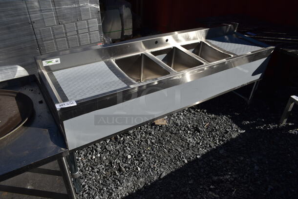 BRAND NEW SCRATCH AND DENT! Regency 600S31014219 Stainless Steel Commercial Back Bar 3 Bay Sink w/ Dual Drain Boards. Bays 10x14. Drain Boards 17.5x15