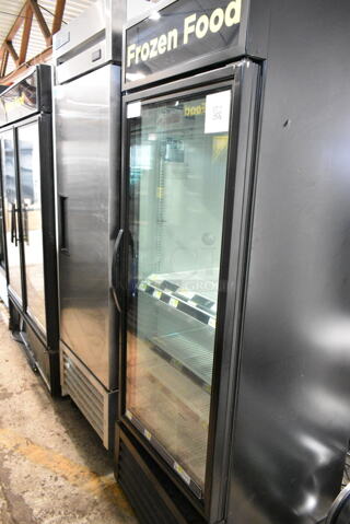 2022 True GDM-23F-HC Metal Commercial Single Door Reach In Freezer Merchandiser w/ Poly Coated Racks. 115 Volts, 1 Phase. 