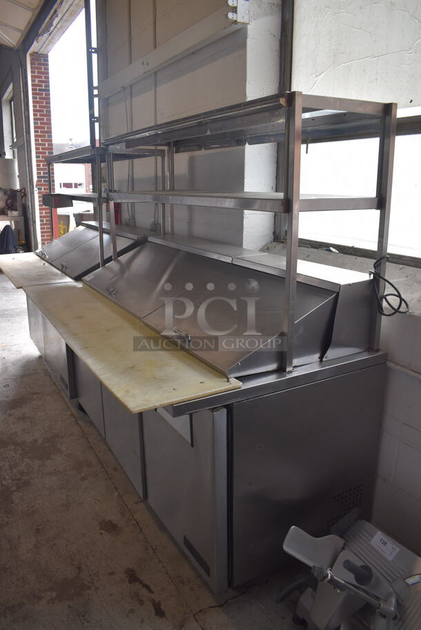 2015 Model True TSSU-72-30M-B-ST Commercial Stainless Steel Sandwich/Salad Prep Table With Overhead Shelving And Refrigerated Base With Steel Racks. 115V/1 Phase. Tested And Working!