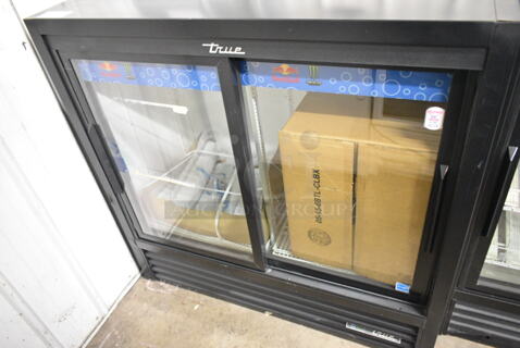 2022 True GDM-41C-48-HC-LD Metal Commercial 2 Door Reach In Cooler Merchandiser w/ Poly Coated Racks. 115 Volts, 1 Phase.