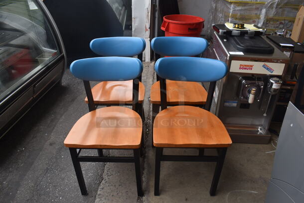 4 Dining Chairs with Blue Padded Backs, Wood Seat and Black Metal Frame. Stock Picture - Cosmetic Condition May Vary. 4 Times Your Bid!