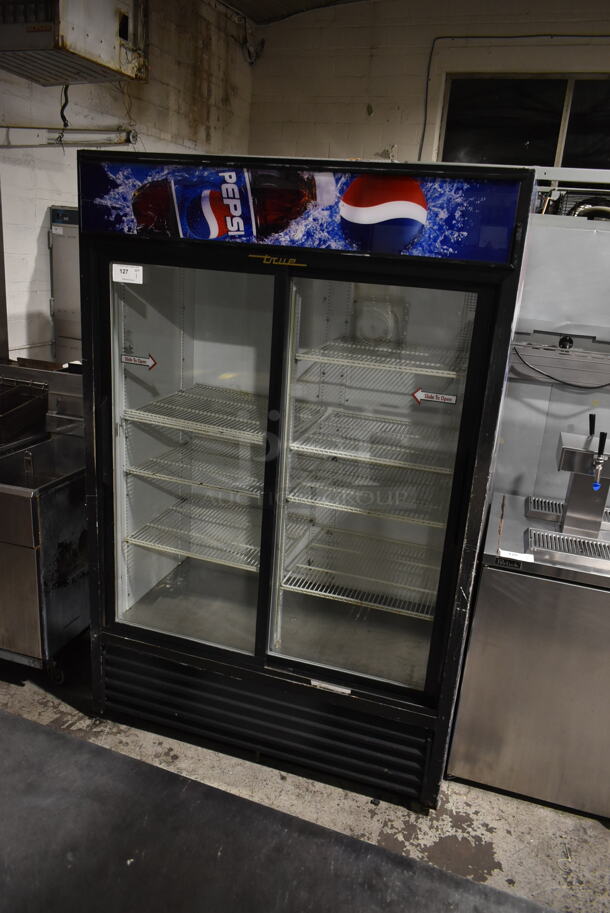 True GDM-45 Metal Commercial 2 Door Reach In Cooler Merchandiser w/ Poly Coated Racks. 115 Volts, 1 Phase. Tested and Powers On But Does Not Get Cold