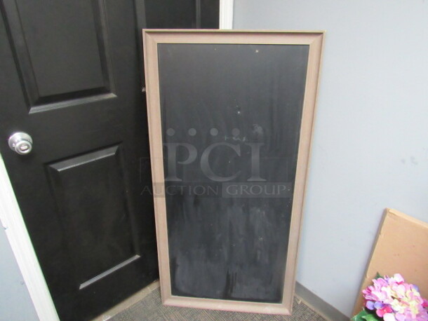 One Wooden Framed Chalkboard. 25X50