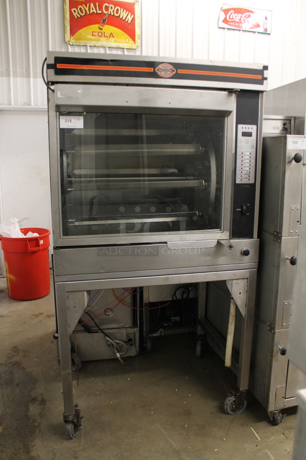 Cleveland BMR-32 Stainless Steel Commercial Natural Gas Powered Rotisserie Oven w/ Skewers and Legs on Commercial Casters. 45,000-60,000 BTU.