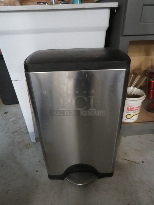 One Stainless Steel Trash Can.