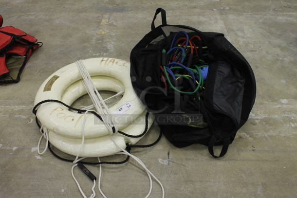 ALL ONE MONEY! Lot of Various Life Raft and Resistance Bands in Black Bag. (Main Building)