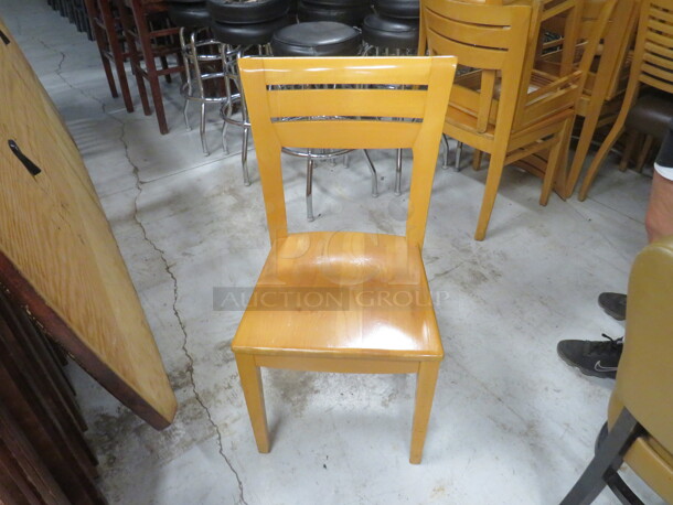 Wooden Chair In A Natural Finish. 4XBID