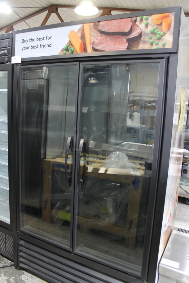 2021 True TVM-48SL-HC-VM01 Metal Commercial 2 Door Reach In Cooler Merchandiser w/ Poly Coated Racks. 115 Volts, 1 Phase. Tested and Working!