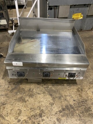 SWEET! Garland Commercial Natural Gas Powered Flat Griddle! With Back & Side Splashes! Model GG36H Serial 2305100102118! On Small Legs!