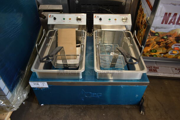 BRAND NEW SCRATCH AND DENT! Cooking Performance Group CPG DF-18-2 Stainless Steel Commercial Floor Style Electric Powered Double Bay Deep Fat Fryer w/ 2 Metal Fry Baskets. 208-240 Volts. Tested and Working!