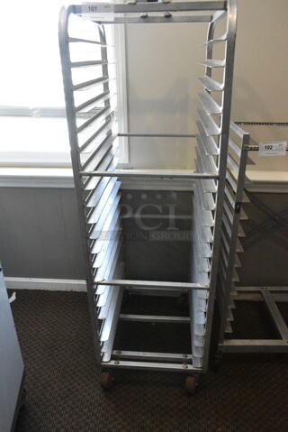 Metal Commercial Pan Transport Rack on Commercial Casters. (secondary dining room)