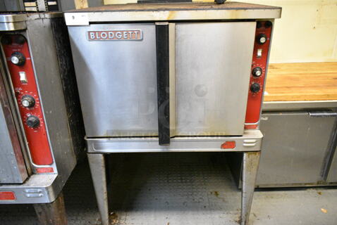 Blodgett Stainless Steel Commercial Electric Powered Full Size Convection Oven w/ Solid Doors, Metal Oven Racks and Thermostatic Controls on Metal Legs. 3 Phase. (kitchen)