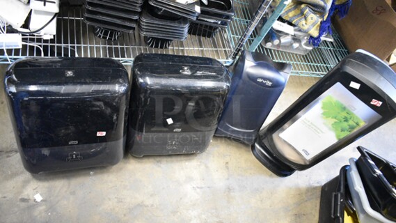 4 Items Including 2 Tork Hand Towel Dispenser and 2 Napkin Dispensers. 4 Times Your Bid! 