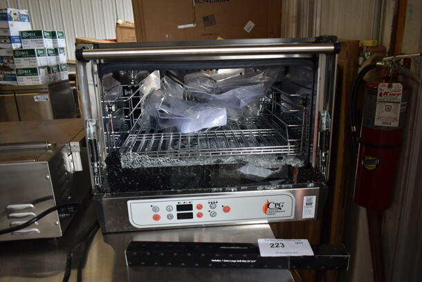 BRAND NEW SCRATCH AND DENT! Cooking Performance Group CPG 351COHD3A Stainless Steel Commercial Electric Digital Countertop 3 Tray Half Size Convection Oven with Steam Injection. See Pictures For Glass Damage. 120 Volts, 1 Phase. Tested and Working!