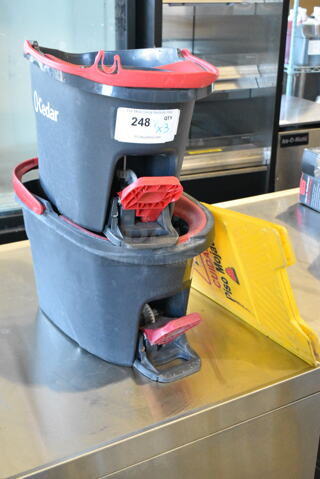 3 Items Including 2 Cedar Mop Buckets and Yellow Poly Wet Floor Caution Sign. 3 Times Your Bid! 