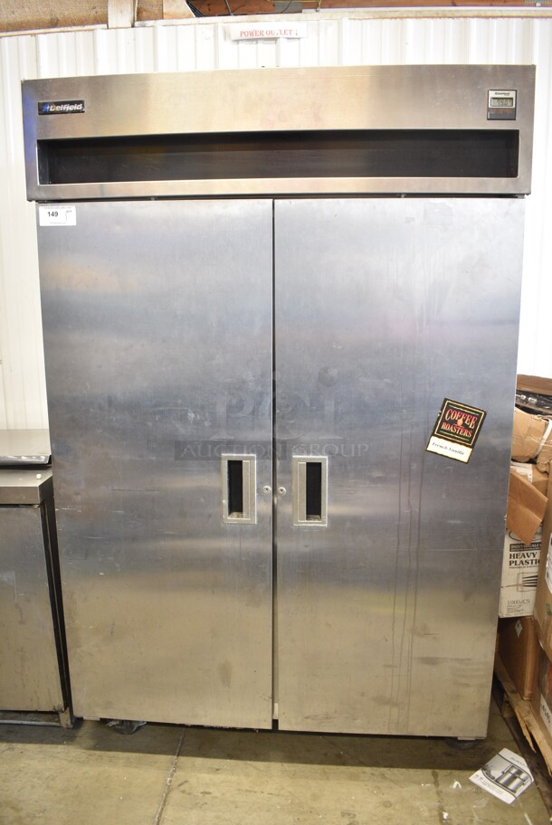 Delfield Stainless Steel Commercial 2 Door Reach In Cooler w/ Poly Coated Racks on Commercial Casters. Cannot Test - Unit Trips Breaker