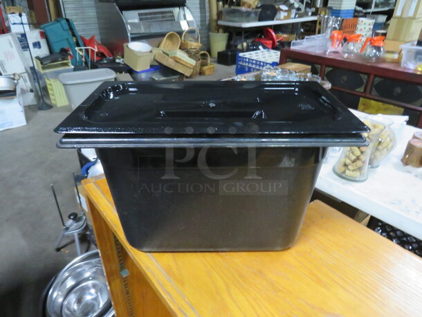 One Black Cambro 1/3 Size 8 Inch Deep Food Storage Container With Lid. 