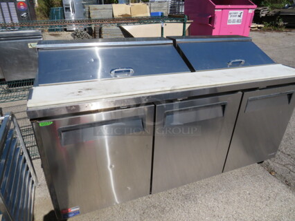 One Turbo Air 3 Door Refrigerated Prep Table With Cutting Board on Casters. Model# MST-72-N. 115 Volt. 73X30X43