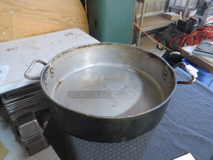 One 20X6 Aluminum Braiser Pan.