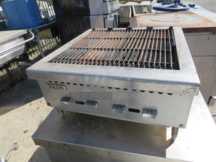 One Vulcan Gas Charbroiler. 25X27X13