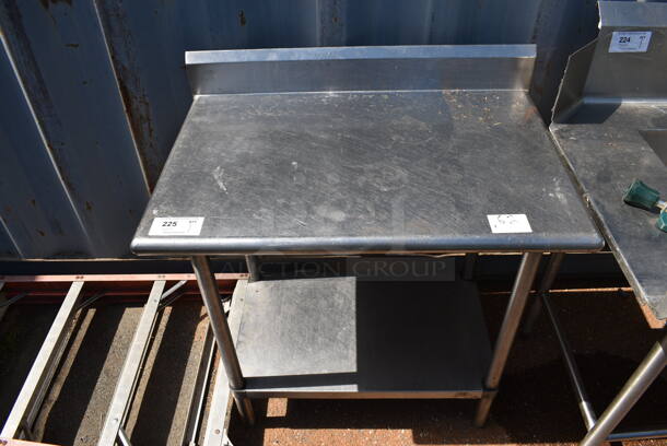 Stainless Steel Table w/ Back Splash and Under Shelf. 36x24x41