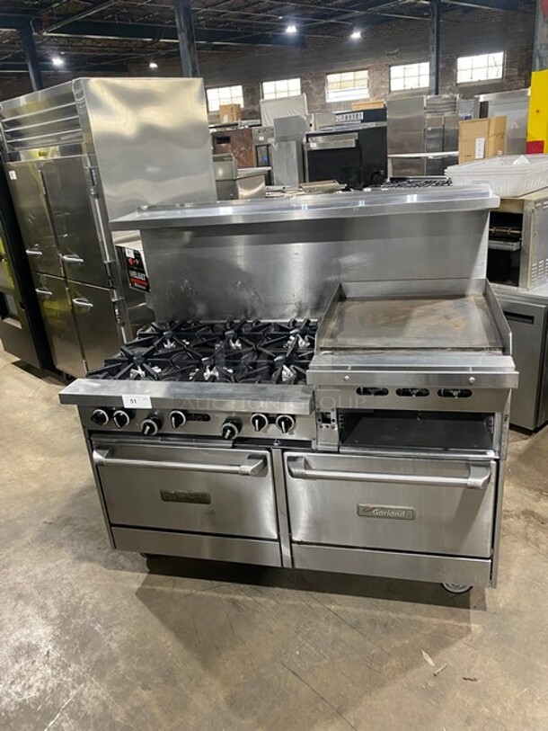 BEAUTIFUL! Garland Commercial Natural Gas Powered 6 Burner Stove With Right Side Flat Griddle! Griddle Has Side Splashes! With Raised Back Splash And Salamander Shelf! With 2 Oven Underneath! ONE OVEN WITH CONVECTION! Metal Oven Racks! All Stainless Steel! On Casters! - Item #1127575