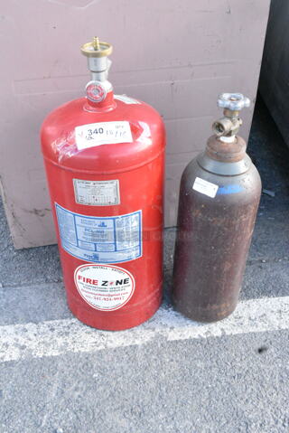 2 Fire Suppression Tanks. 2 Times Your Bid! Buyer Must Pick Up - We Will Not Ship This Item.