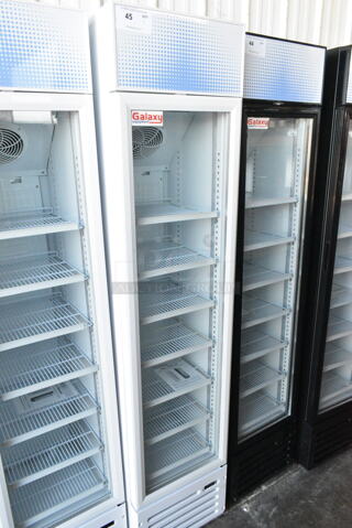 BRAND NEW SCRATCH AND DENT! Galaxy 177GDN5RBW Metal Commercial Single Door Reach In Cooler Merchandiser w/ Poly Coated Racks and Red, White, and Blue LED Lighting. 110-120 Volts, 1 Phase.