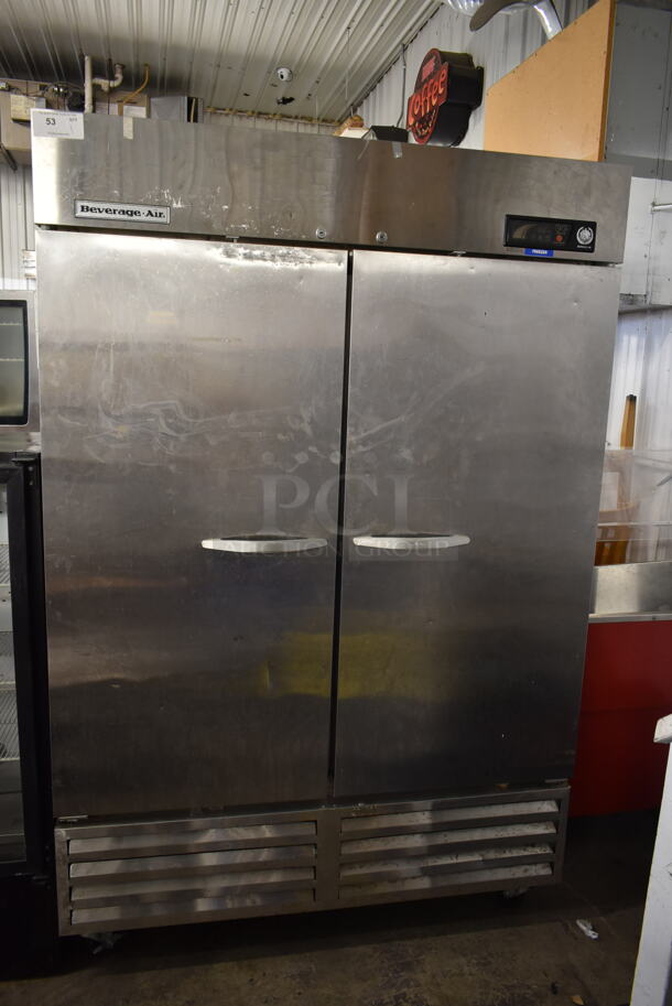 Beverage Air KF48-1AS Stainless Steel Commercial 2 Door Reach In Freezer w/ Poly Coated Racks on Commercial Casters. 115 Volts, 1 Phase. Tested and Powers On But Does Not Get Cold