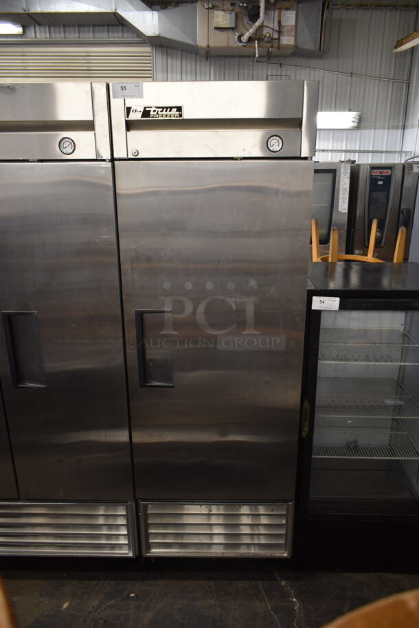True T-23F Stainless Steel Commercial Single Door Reach In Freezer w/ Poly Coated Racks on Commercial Casters. 115 Volts, 1 Phase. Cannot Test - Unit Trips Breaker.