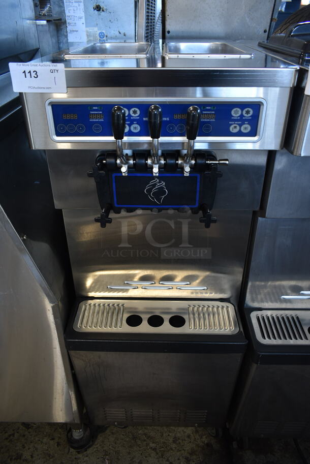 2012 Well Spring ISI-203SN Stainless Steel Commercial Floor Style Air Cooled 2 Flavor w/ Twist Soft Serve Ice Cream Machine on Commercial Casters. 220 Volts, 3 Phase.