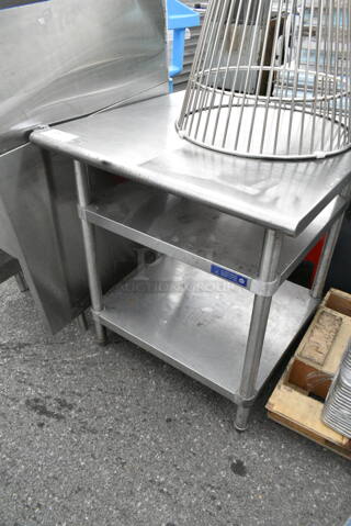 Stainless Steel Table w/ 2 Under Shelves. 