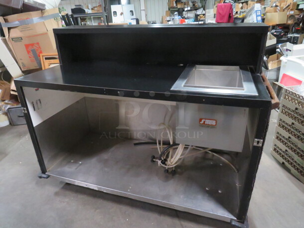One Portable Bar With An Ice Well With Cold Plate, Stainless Steel Under Shelf, Over Shelf, And Storage, On Casters. 64X29X49