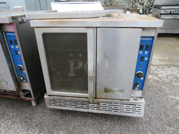 One Imperial Natural Gas Oven With 3 Racks. 38X38X34