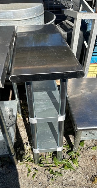 One Stainless Steel Table With 2 Stainless Under Shelves. 36X14X35