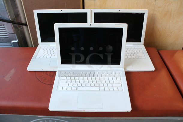 3 Apple Model A1191 13.5" Laptops. 3 Times Your Bid!