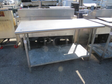 One Stainless Steel Table With Under Shelf. 60X30X35.5