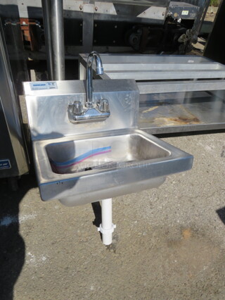 One Omcan Stainless Steel Hand Sink With Back Splash And Faucet. 17X16