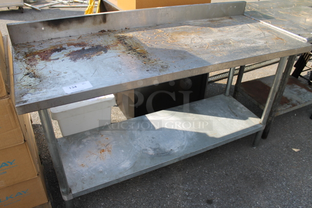 Stainless Steel Commercial Table w/ Back Splash and Under Shelf.